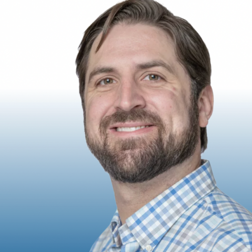 Professional headshot of a smiling Equity team member with a beard